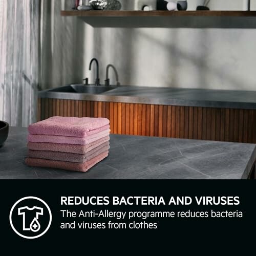 Stack of towels on kitchen counter with anti-allergy message.