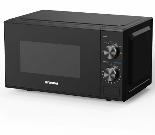 Black microwave oven with control knobs.