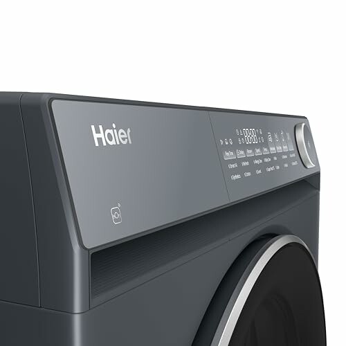 Close-up of Haier washing machine control panel.