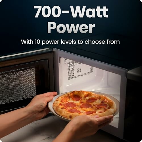 Microwave with 700-watt power cooking a pepperoni pizza.