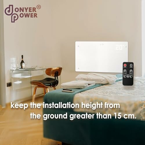 Modern bedroom with wall-mounted heater and remote control.