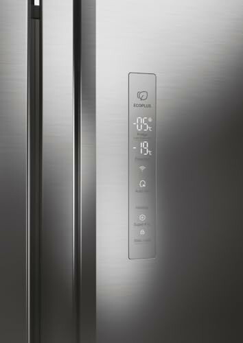 Close-up of a refrigerator control panel with digital display.