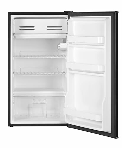 Open mini refrigerator with empty shelves