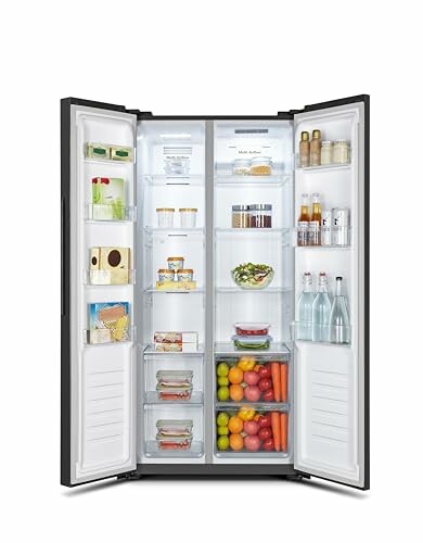 Open refrigerator filled with various food items and drinks.
