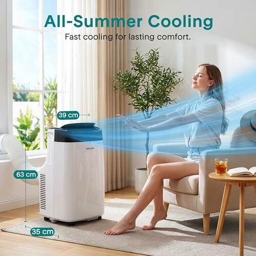 Woman enjoying cool air from a portable air conditioner in a living room.